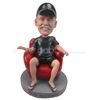 Personalized custom man sitting on red sofa bobbleheads