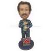 Custom bobblehead man in casual checked shirt with a baseball in hand