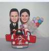 Personalized custom sweet bride and groom with their red sports car bobblehead