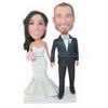 Groom in black suit with the bride holding a bunch of flowers custom bobbleheads