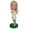 Young girl in white dress playing golf custom bobbleheads