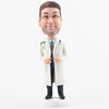 Kind doctor bobbleheads with white uniform
