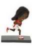 Athletes bobble head doll in the run