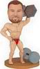 Male bobble head doll with dumbbell