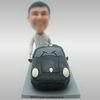 Custom male bobble head doll with a Car