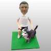 Casual man with dog bobbleheads