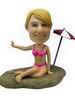 Bobblehead Wearing a pink bikini beauty on the beach