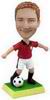 The footballer bobble head doll foot hook the ball