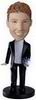 Male bobble head doll - holding flowers