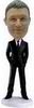 Boss bobblehead wearing a black suit