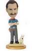 Casual male bobble head dol with pet