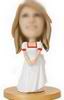 Girl bobble head doll with white dress