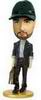 Handsome man bobble head doll in suit