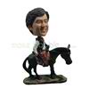 The man is riding on horseback custom bobbleheads