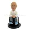 The man sits in a wheelchair custom bobbleheads