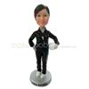 The woman is a football coach custom bobbleheads