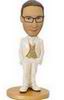 Male bobblehead in white suit