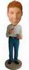 A man bobblehead with blue jeans