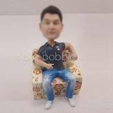 Personalized custom man in sofa bobbleheads