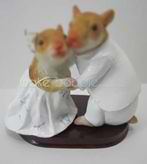 Customized bobbleheads of wedding cake