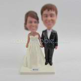 Customized bobble head of wedding cake