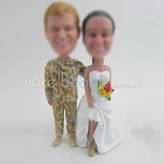 Custom bobblehead of wedding cake