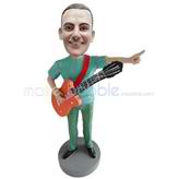 homme professionnel sur mesure et guitare figurines