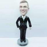 Custom black suit bobbleheads