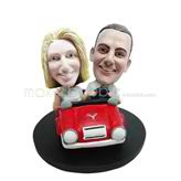 Personalized couple in red car bobble heads