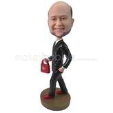 Custom man bobbleheads with a red handbag