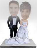 Personalized bride in long wedding dress with his groom bobblehead