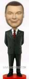 Personalized custom man in black suit matching red tie bobblehead 