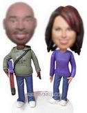 Personalized custom man holding climbing stick with his girl bobblehead