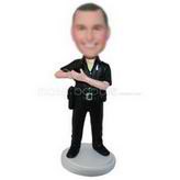 Police in black suit holding a black pigeon custom bobbleheads