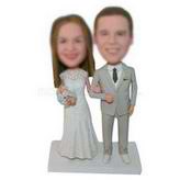 Groom in grey suit with his bride in white wedding dress custom bobbleheads