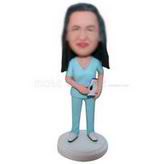 Old female nurse in blue work suit custom bobbleheads