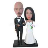 Serious groom in black suit and bride in white wedding dress custom bobbleheads