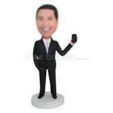 Business man in black suit holding a black box custom bobbleheads