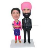 Groom in black suit matching with red cap and his Arab bride custom bobbleheads