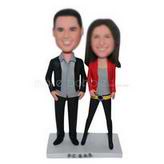 Husband in black coat and wife in red coat custom bobbleheads