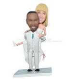 Groom in grey suit carrying his bride in white wedding dress custom bobbleheads