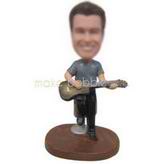 Long face boy playing the guitar sitting on the chair custom bobbleheads