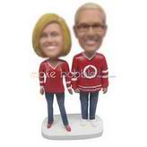 Wife in red T-shirt and husband in red T-shirt custom bobbleheads 