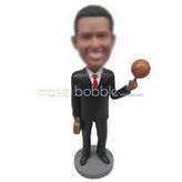 Business man in black suit handing up with a basketball custom bobbleheads 