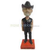 Man in black suit wearing a black cap custom bobbleheads