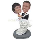 Groom in black suit holding bride in white wedding dress custom bobbleheads