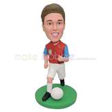 Active young boy bobble head doll