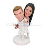 Customized handmade happy wedding bobblehead with a Rugby