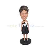 Personalized handmade bridesmaid bobblehead with a white and black skirt