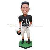 Black and white jersey bobble head doll